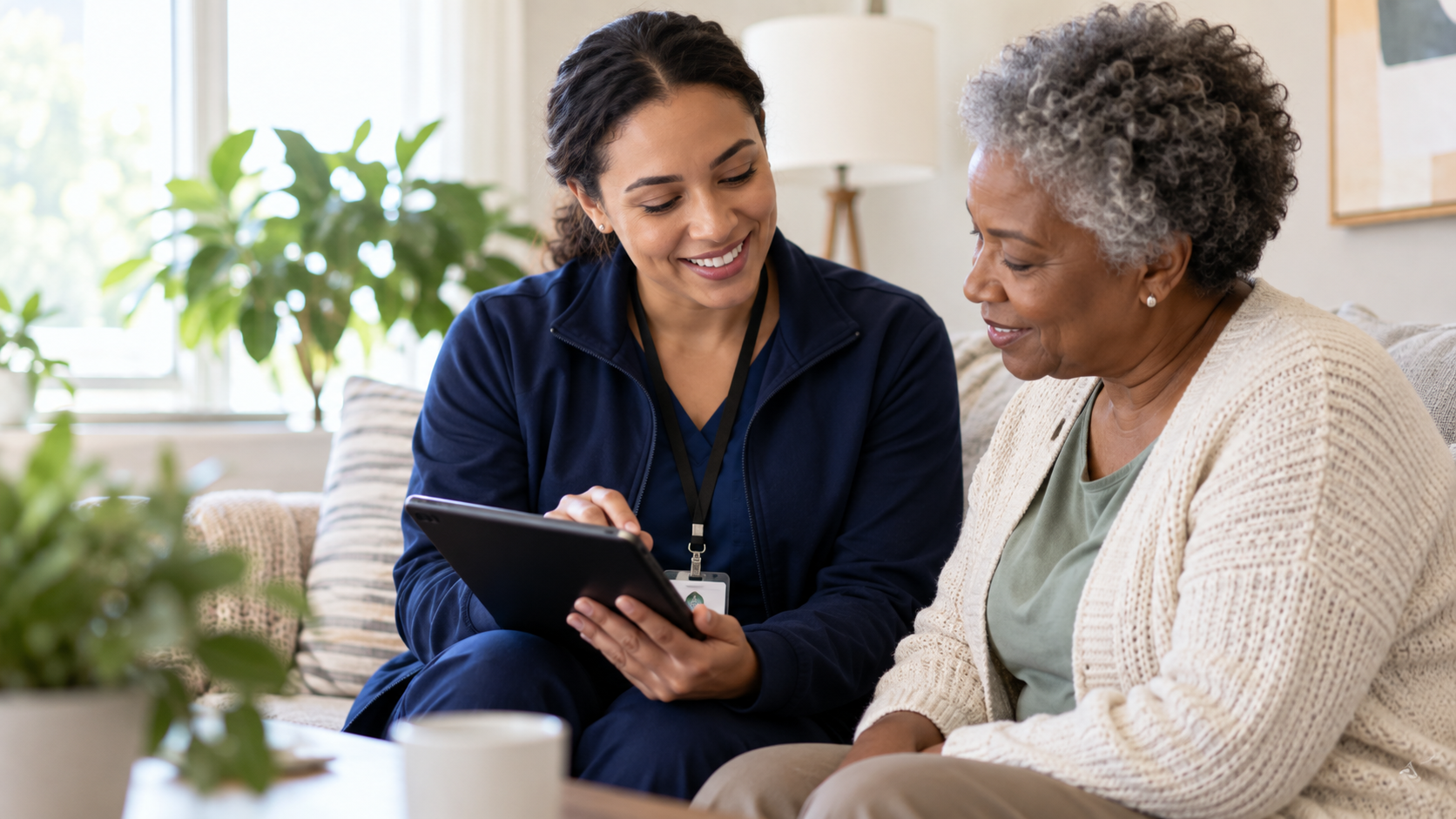 Care management professional reviewing information with an older adult during an in-home visit.